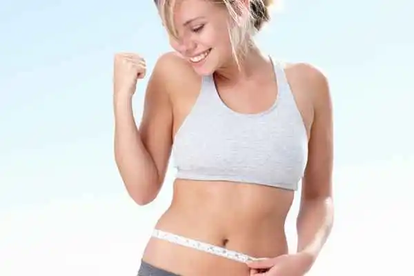woman happy after fat reduction treatment Whitley Bay